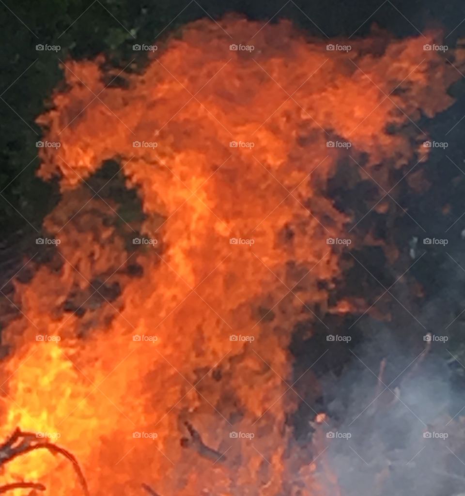 Intense fire flames and heat creates an explosive portrait 
