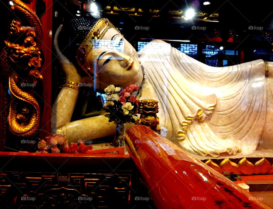 Jade Buddha Temple, detail of a sacre statue in Shanghai, China