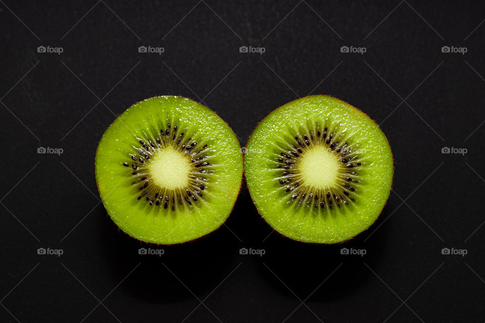two halves of a kiwi