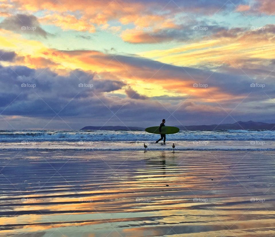 Surfer and sunset