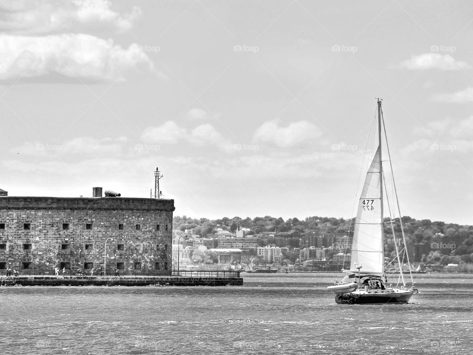 Sailing to Governor's Island. Black and white photo of a vintage sailboat cruising the Hudson River towards Governor's Island.
Zazzle.com/Fleetphoto