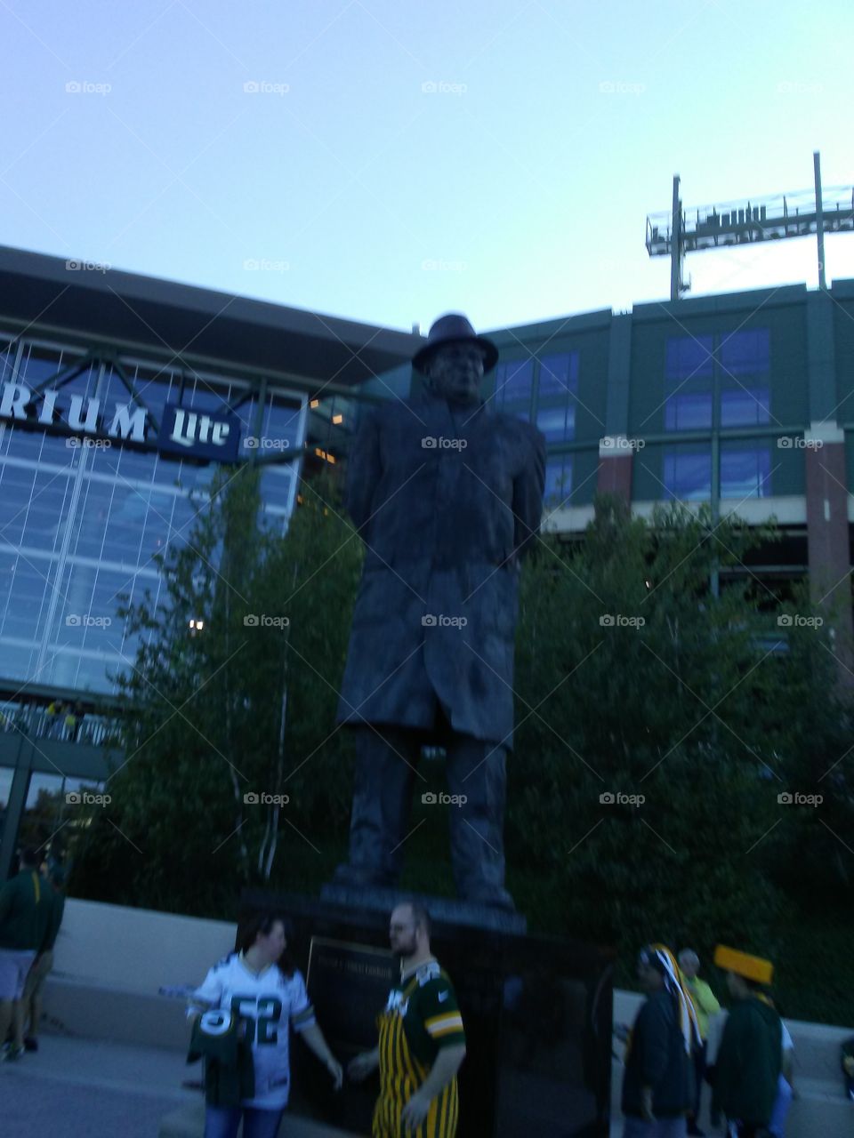 A giant stature of the great Vince Lombardi outside the Titletown Atrium at Lambeau FIeld in Green Bay,  Wisconsin.