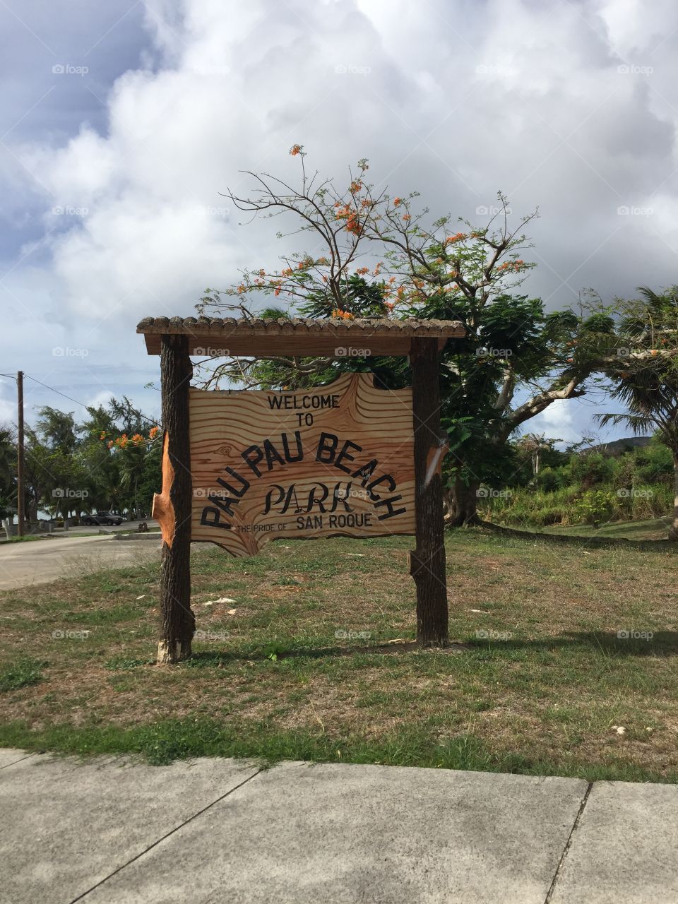 Entrance sign to Pau Pau Beach, Saipan