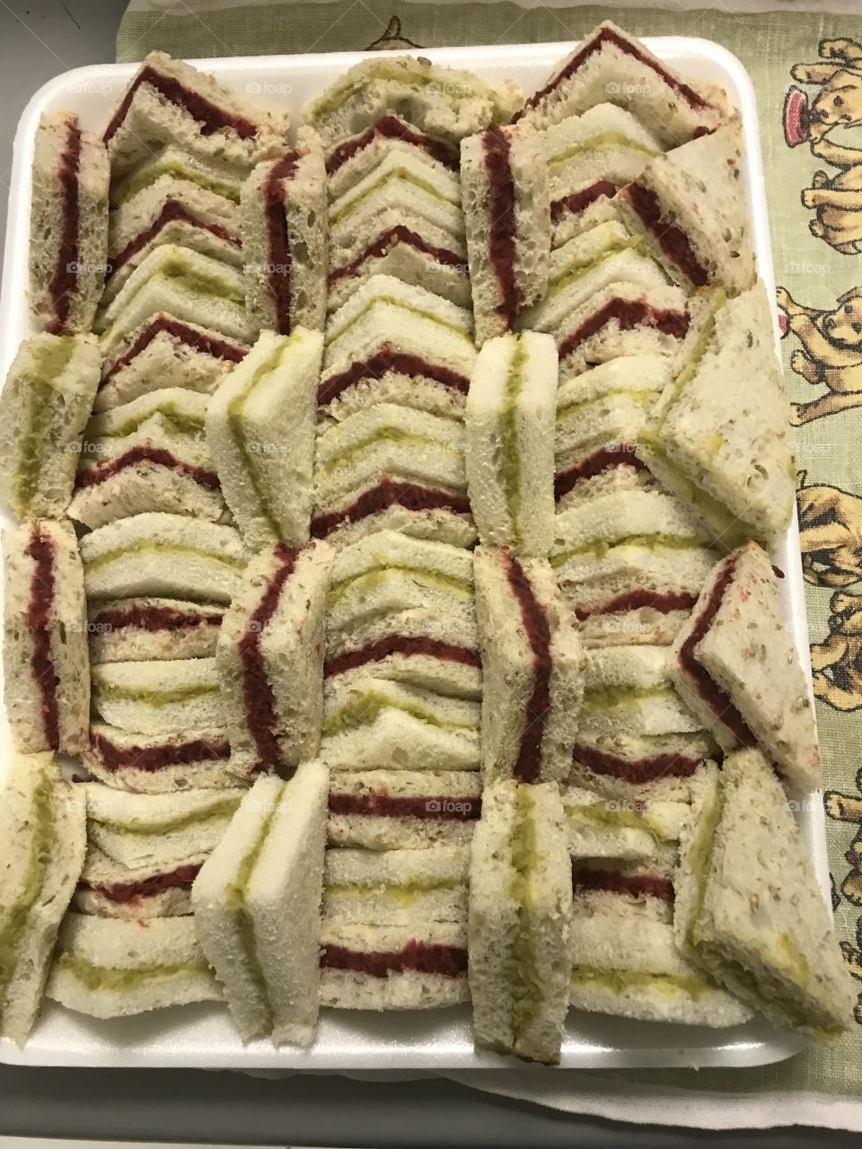 Vegetarian sandwiches with red colour ( Beetroot ) and Green colour (  green peas)