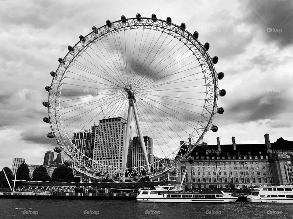 The famous London Eye over river Thames in United Kingdom 