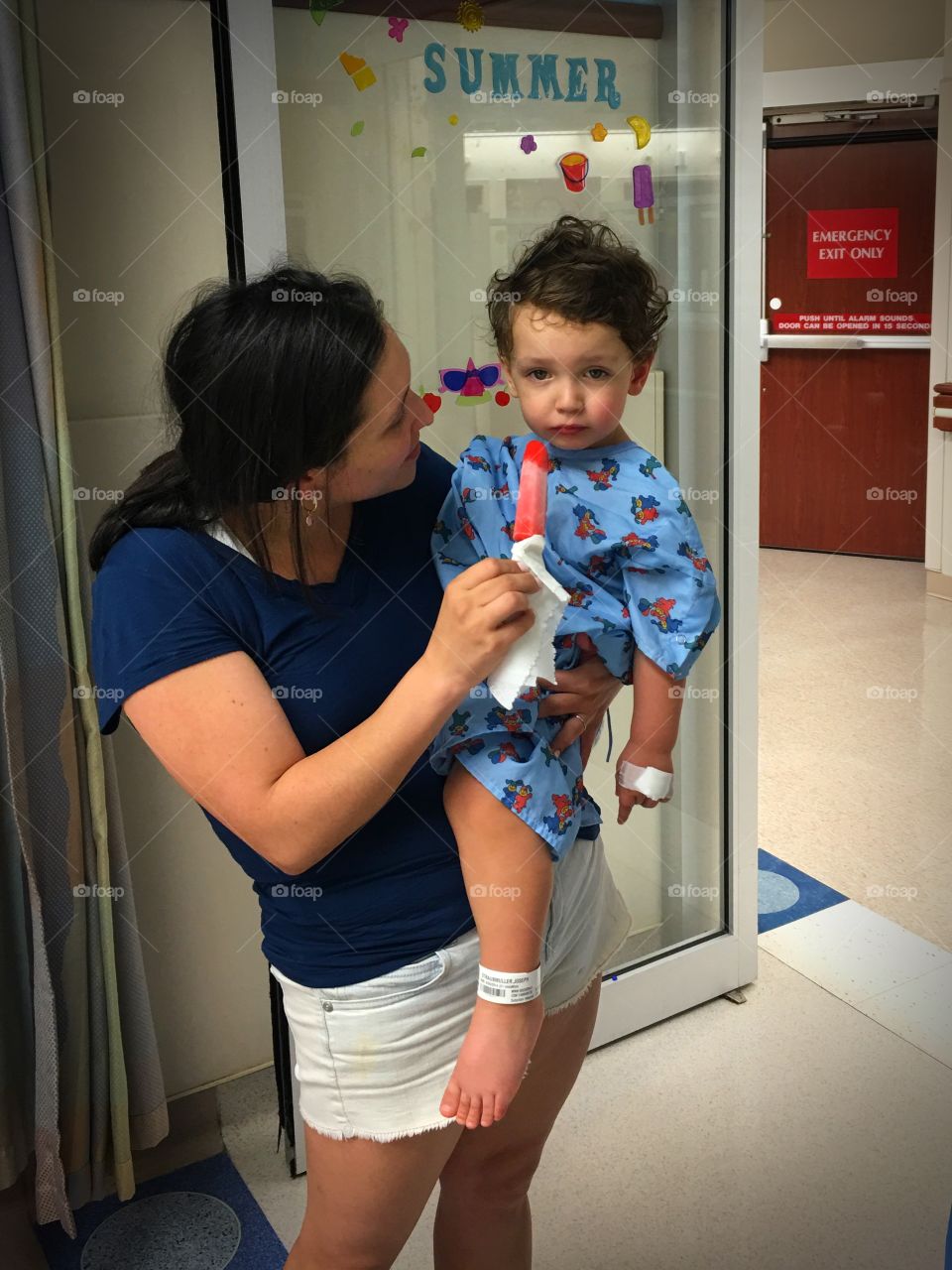 A sick child with the flu in the emergency room at the hospital