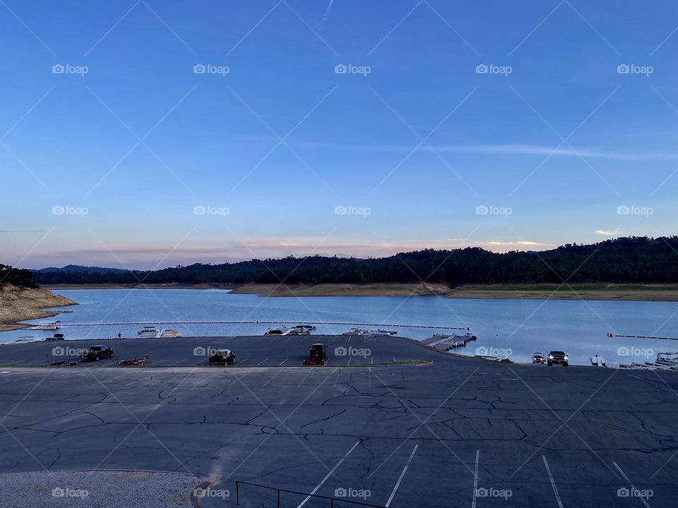 Sunset at Lake Nacimiento California over the Oak Shores parking lot 