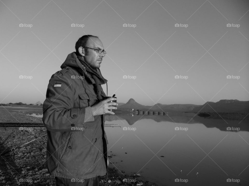 at the lake drinking coffee