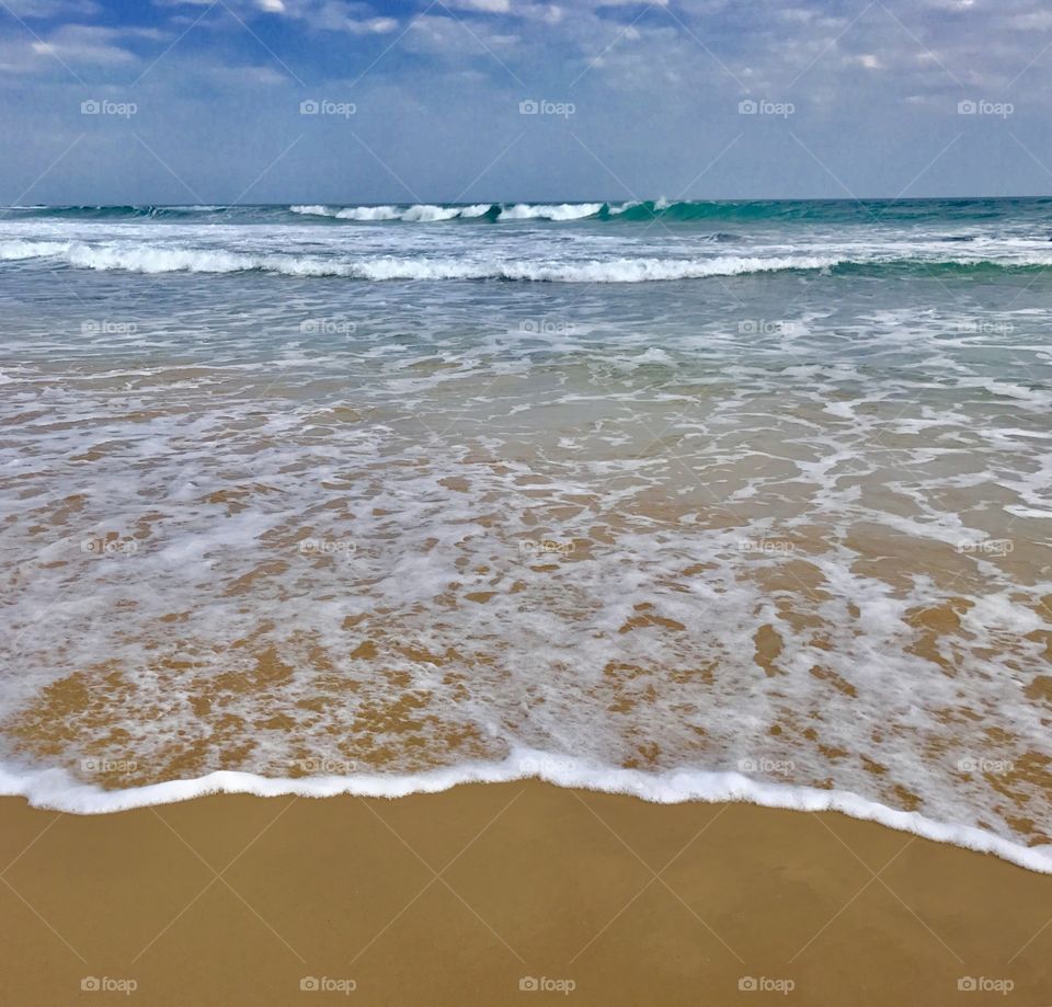 The beautiful waves keep rolling in at Surf Beach