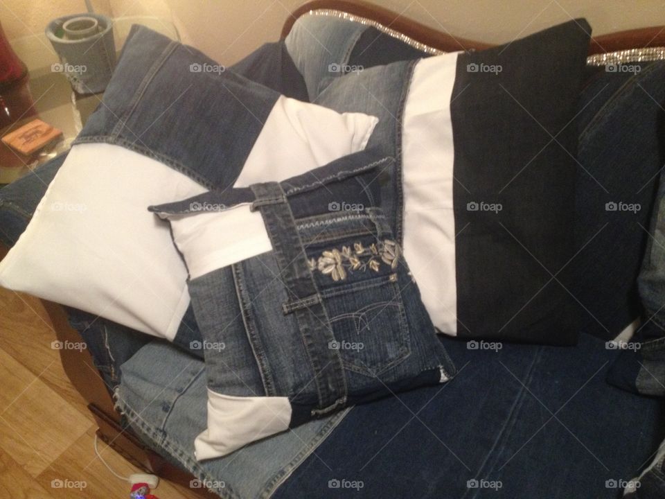 Pillows. Recycled jeans and retired military dress whites turn into comfort 