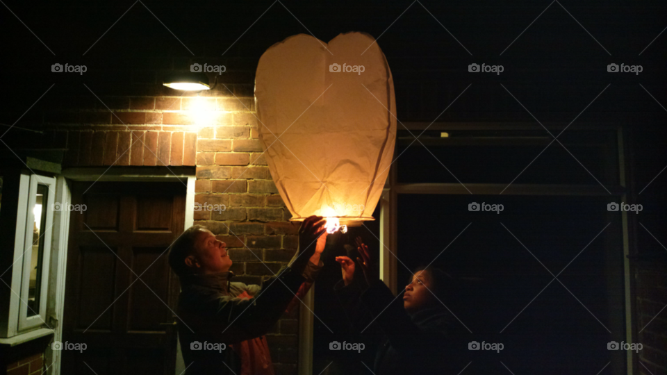 couple celebration lantern new years eve by ntiffin72