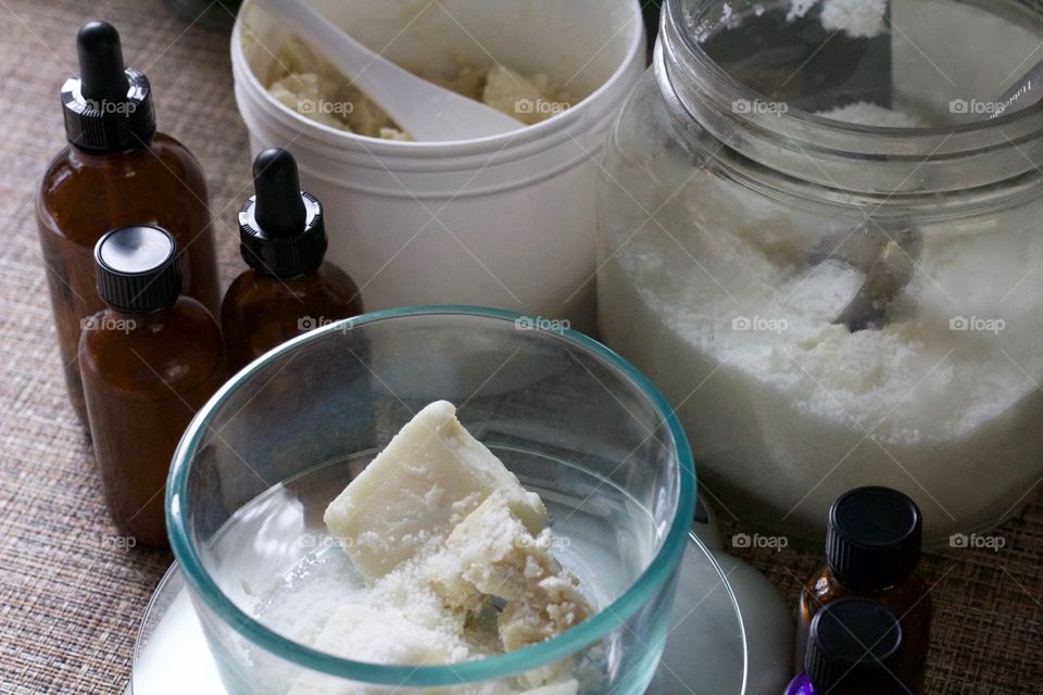 Weighing ingredients on a digital scale  for homemade skin care products 