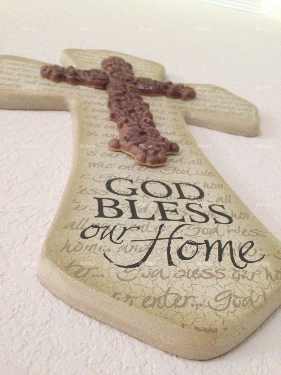 God bless our home. Cross hanging in our home