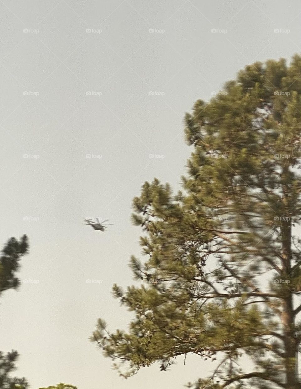 A helicopter passing over 