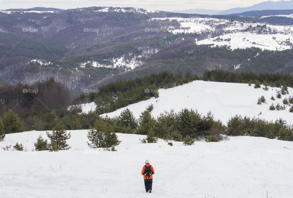 Hiking in the winter mountain