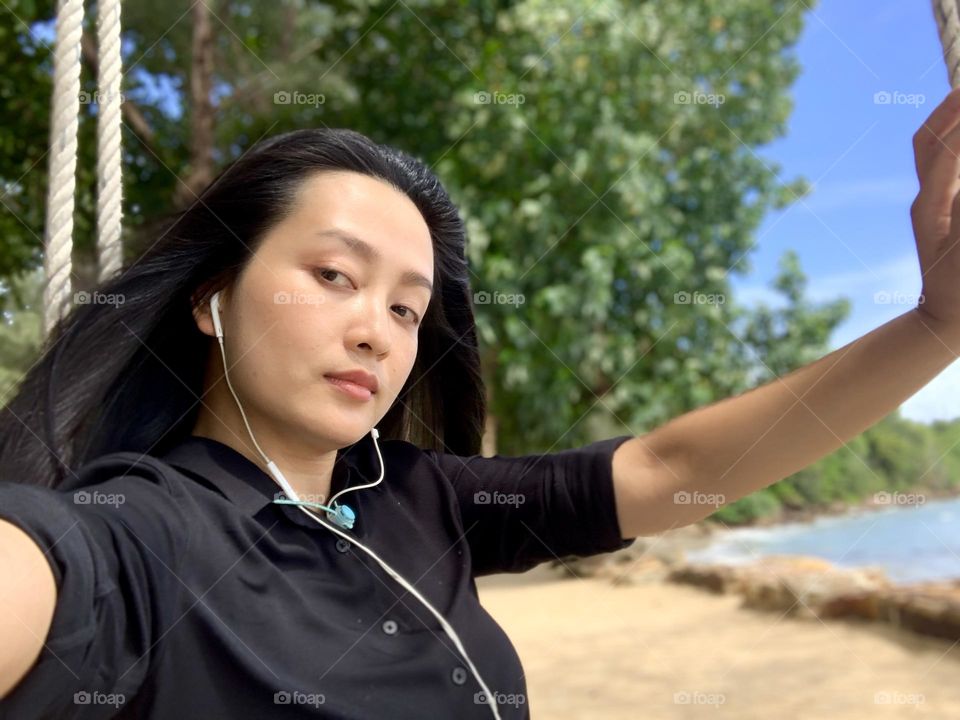 Girl in black, natural look of woman who got challenging on her face