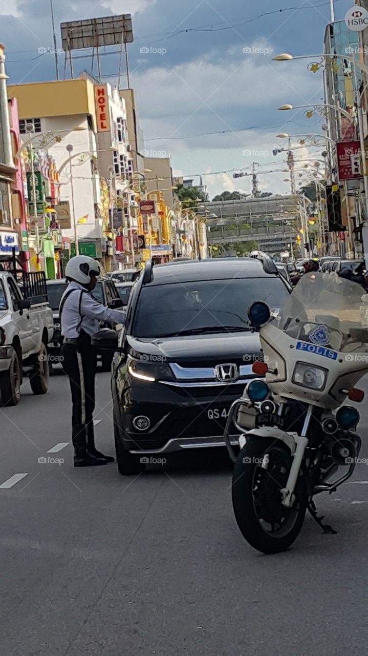 Traffic police in action in Seremban