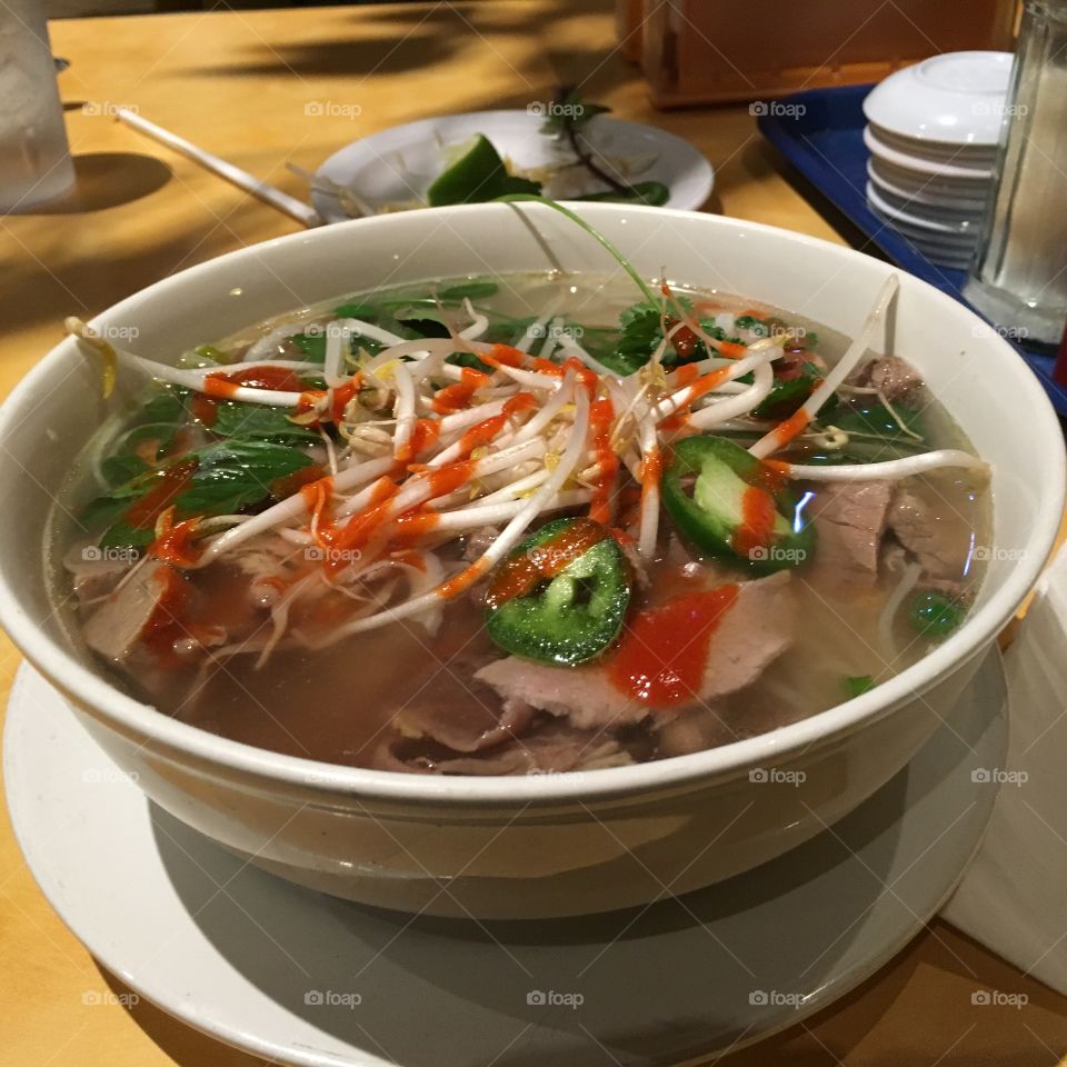 Pho with everything and topped with sriracha