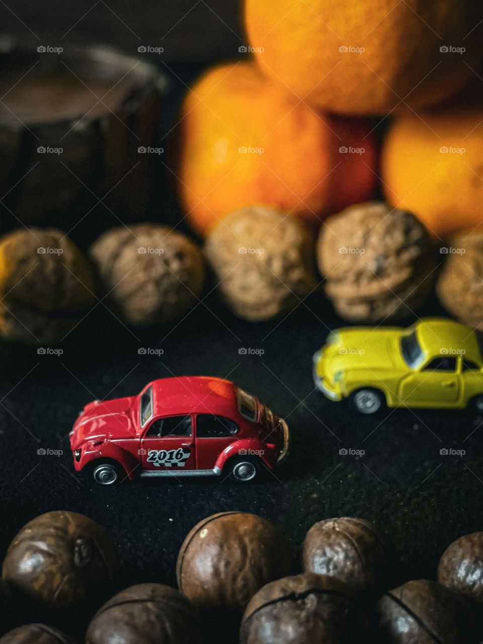 Miniature cars travelling in the world of food