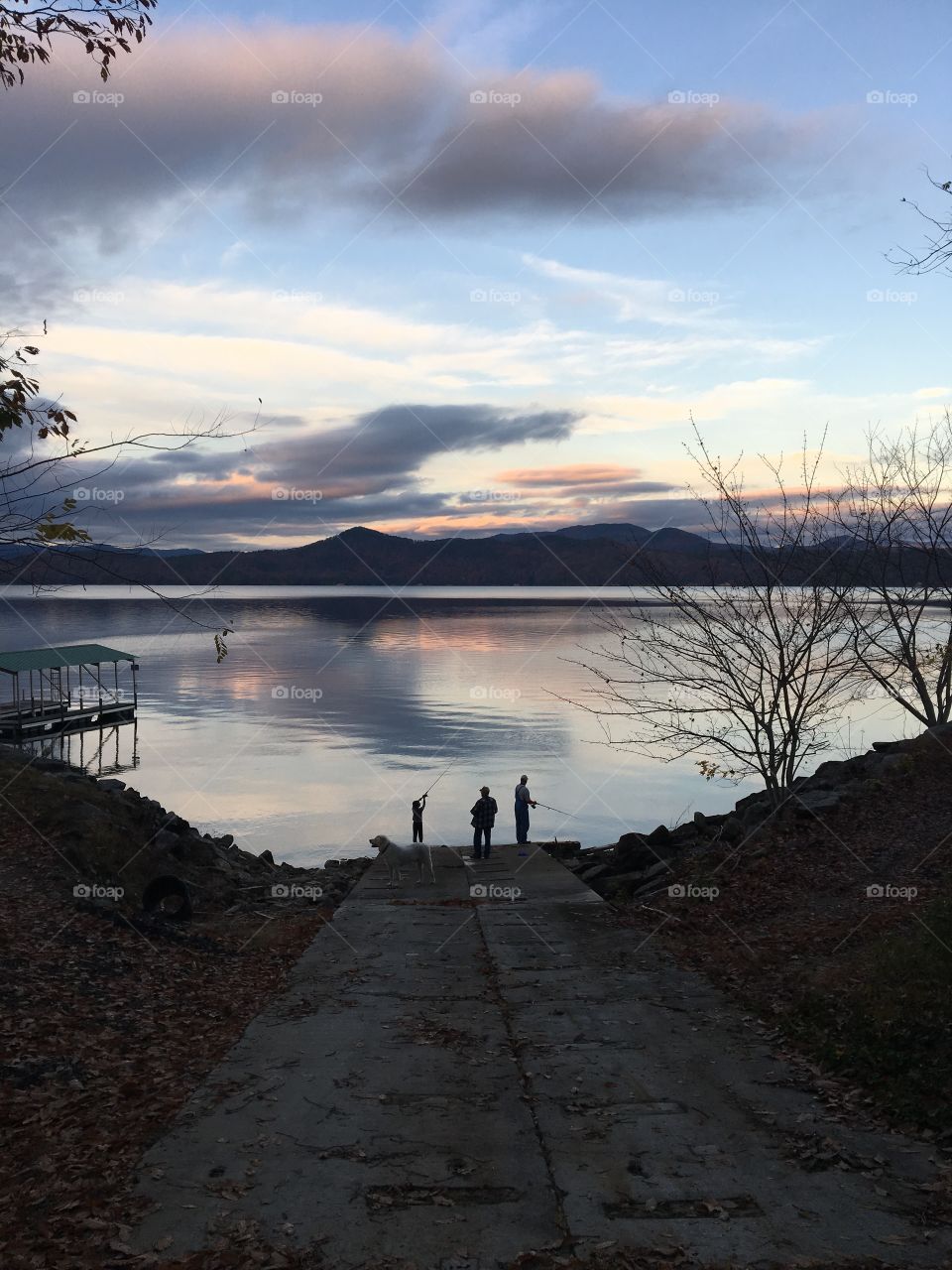 My husband, his father, and one of our sons decided to go fishing tonight. I followed behind after getting lunches ready for tomorrow. The sunset was amazing over Lake Jocassee! This picture tells the story of our family. We love spending time together! 