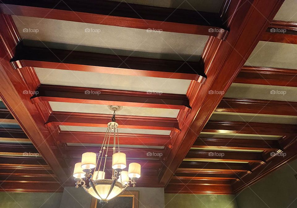 Solid wood beams in the ceiling of the dining room are another interesting architectural feature of the Pittock Mansion in Oregon