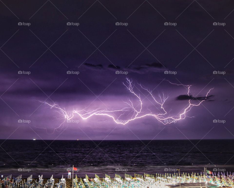 Thunderstorm with lightning over the sea