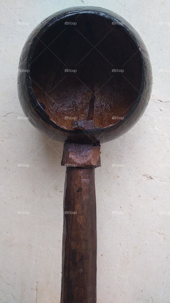 The ancient dipper is made of coconut skin and wood