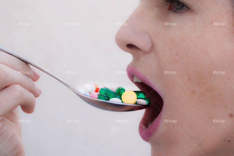 Woman taking medicines