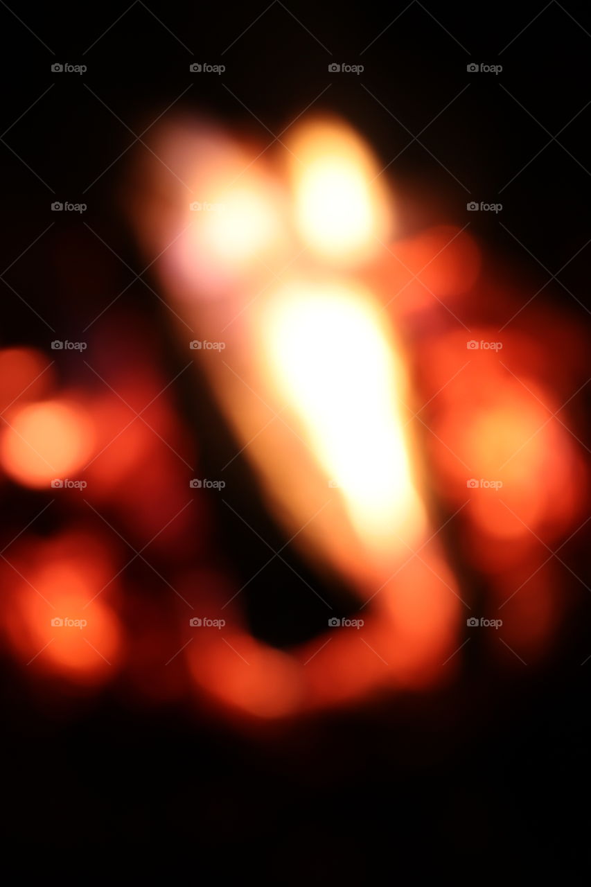 Bokeh blur of a campfire at night