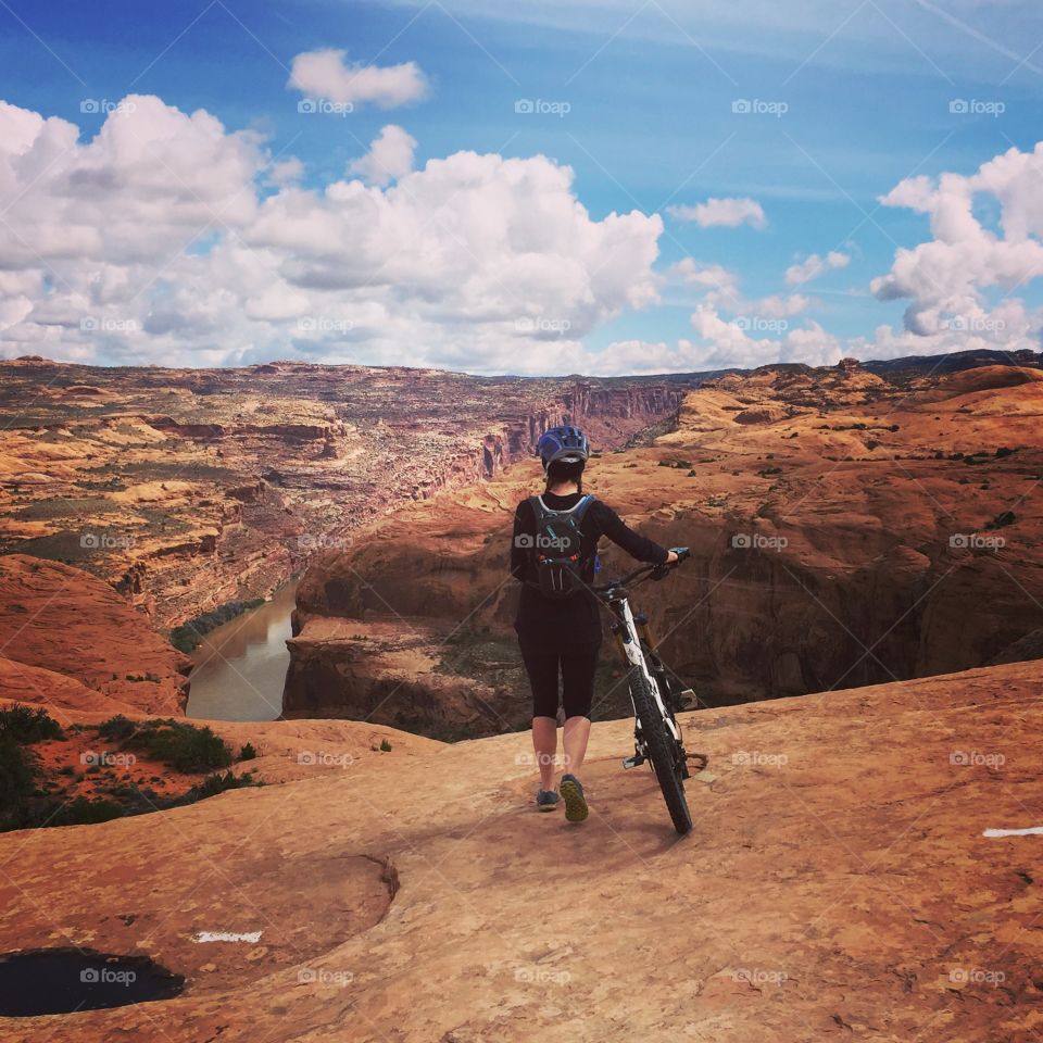 Mountain biking girl reaching new heights