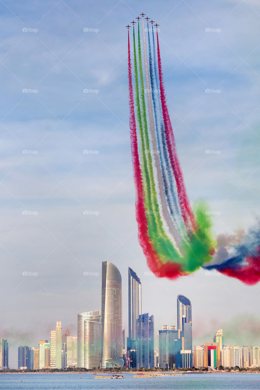 Al Fursan aerobatic team flying over Abu Dhabi