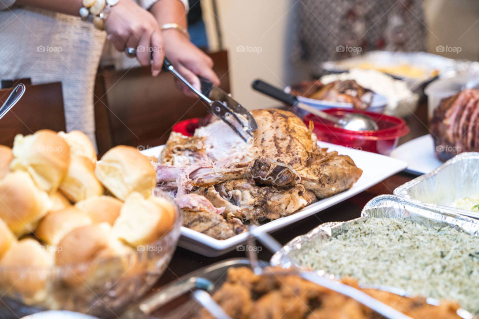 Close-up of person serving food