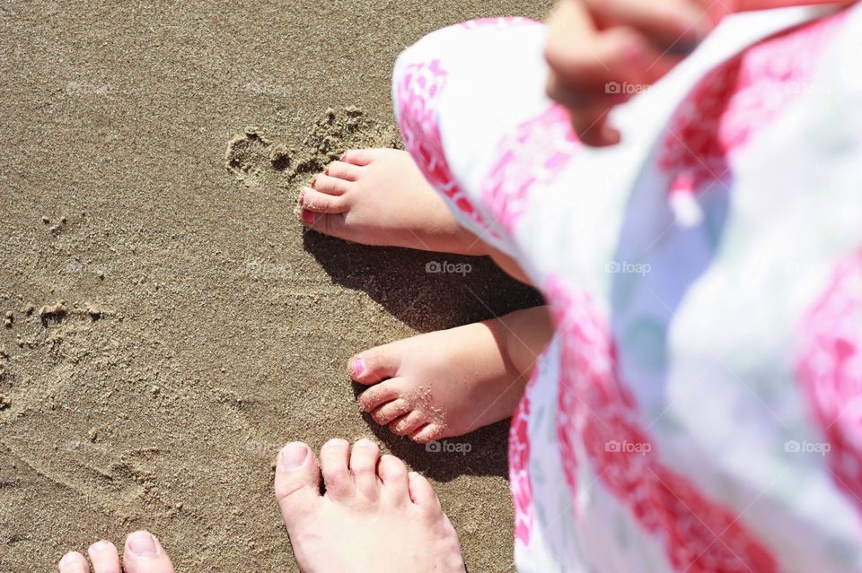 toes in the sand. taken in santa Barbara, enjoying the beautiful weather and sun.