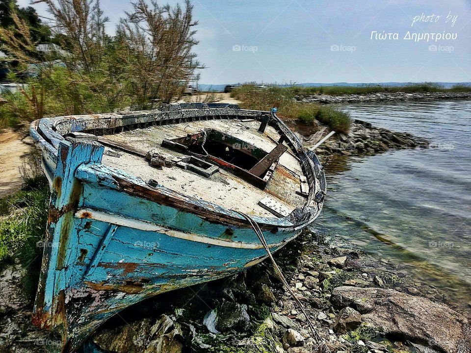 Broken old boat on the shore..!!