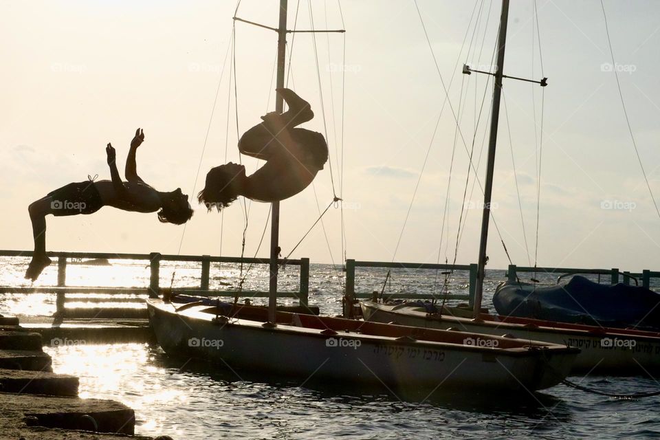Flipping stunts from the dock
