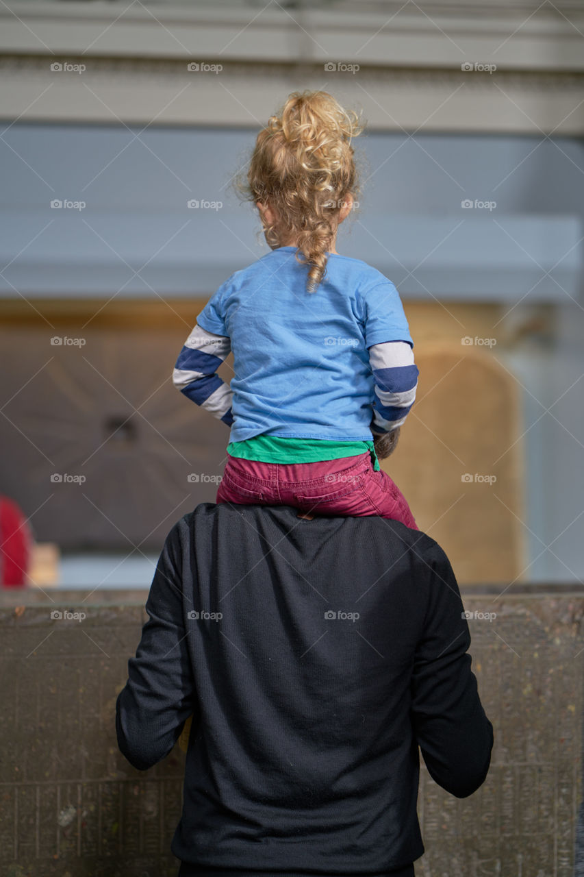 Needing some additional height. Father and daughter at the museum 