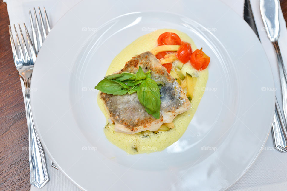 Fish with tomates