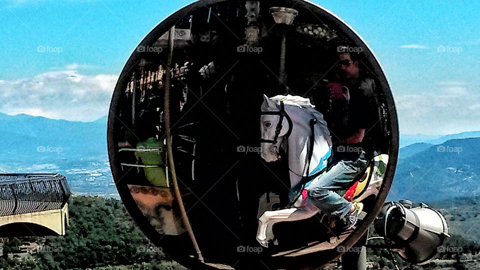 Mirror on the carousel. 
Barcelona, Spain