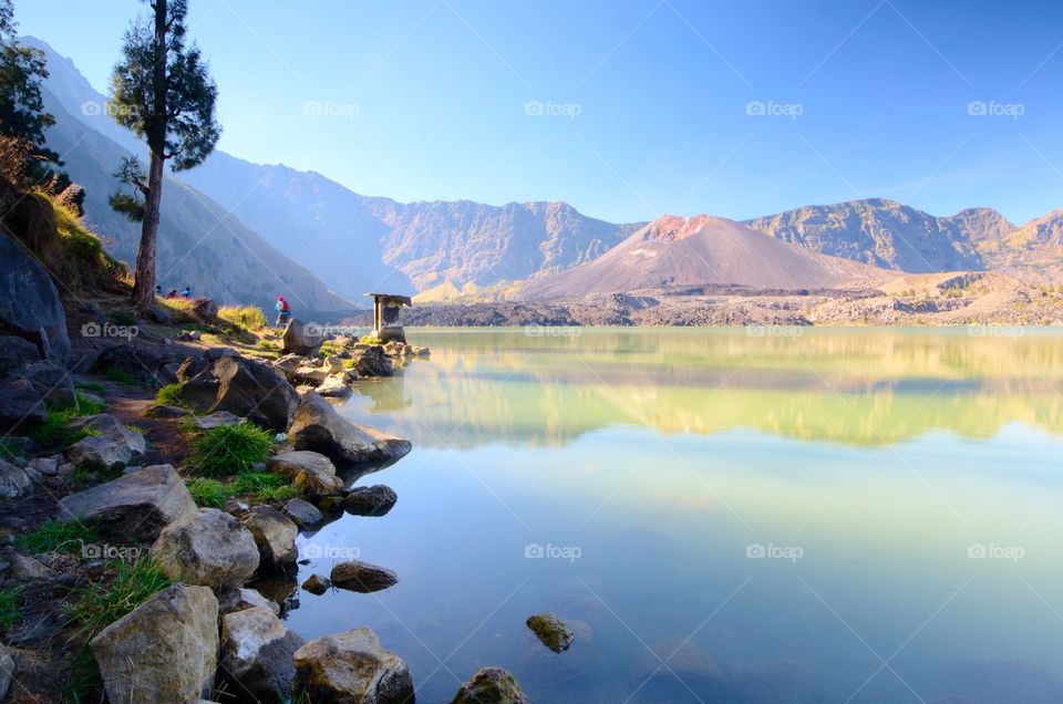 Beautiful nature background at Segara Anak Lake in early morning. Mount Rinjani is an active volcano in Lombok, indonesia. Soft focus due to long exposure.