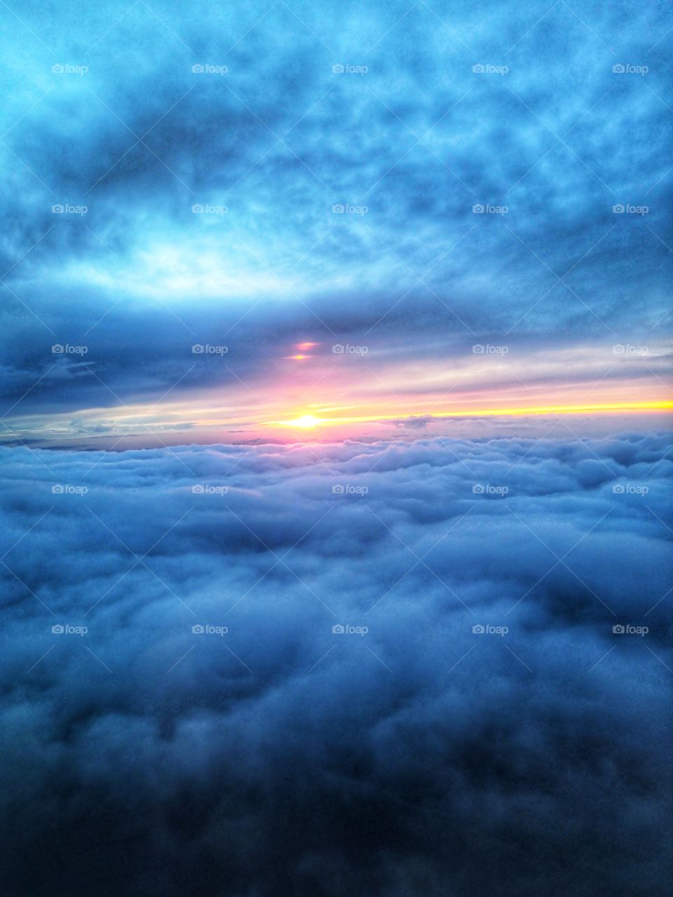 Sunset above the clouds