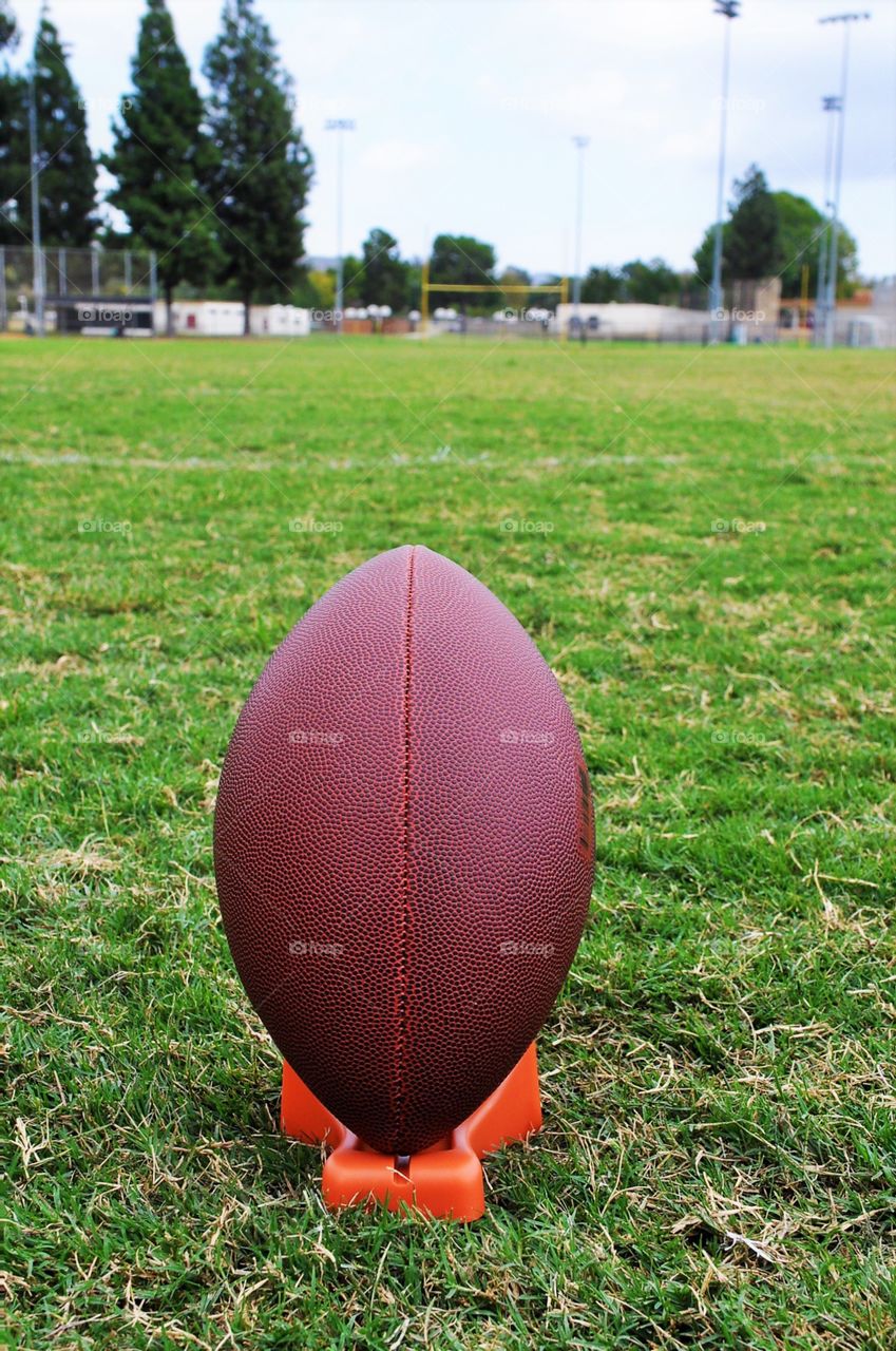 Playing football outdoors