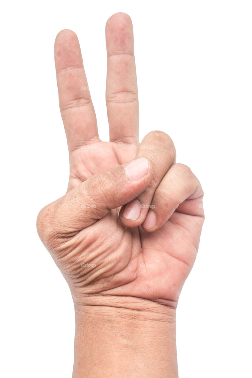 A man's hand shows two finger on a white background.