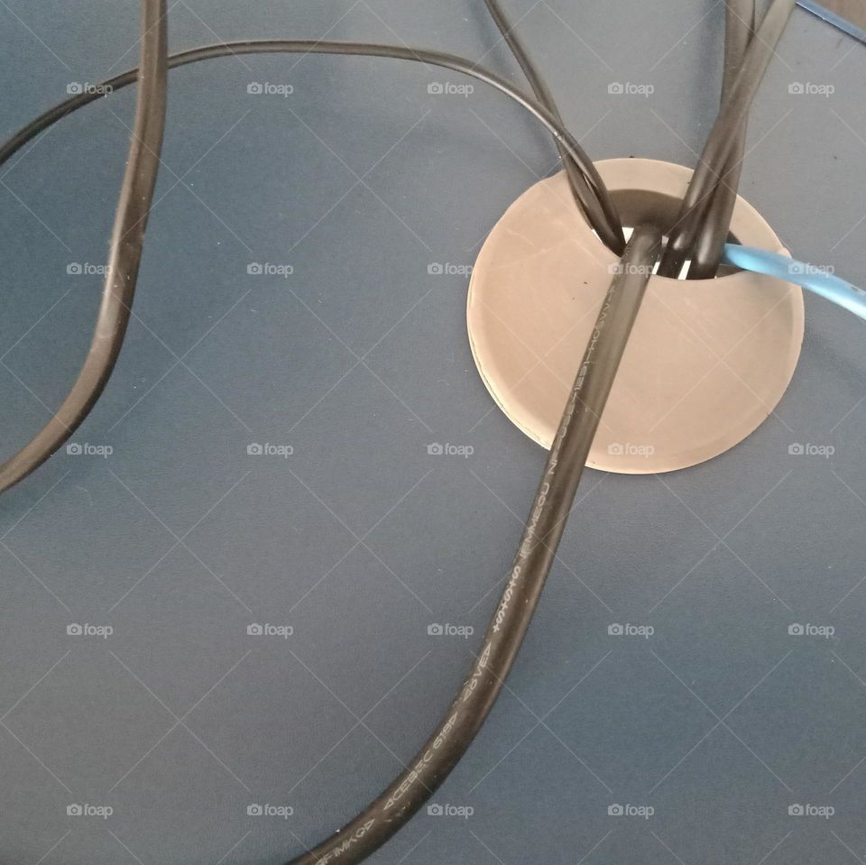 A cable hole on a desk