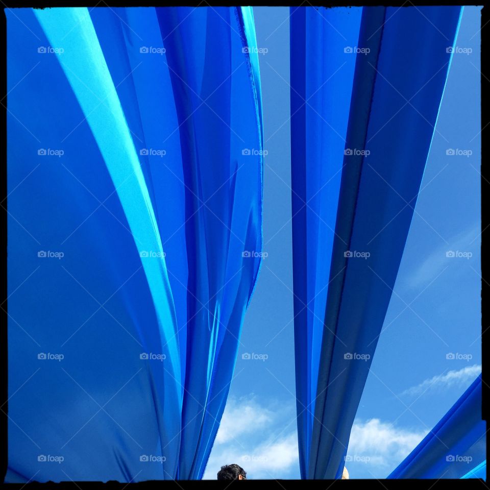 Blue fabric on blue sky