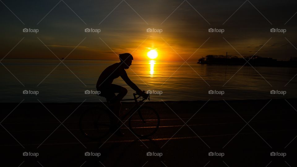 Sunrise bike ride . Early morning bike ride along Lake Michigan in Chicago
