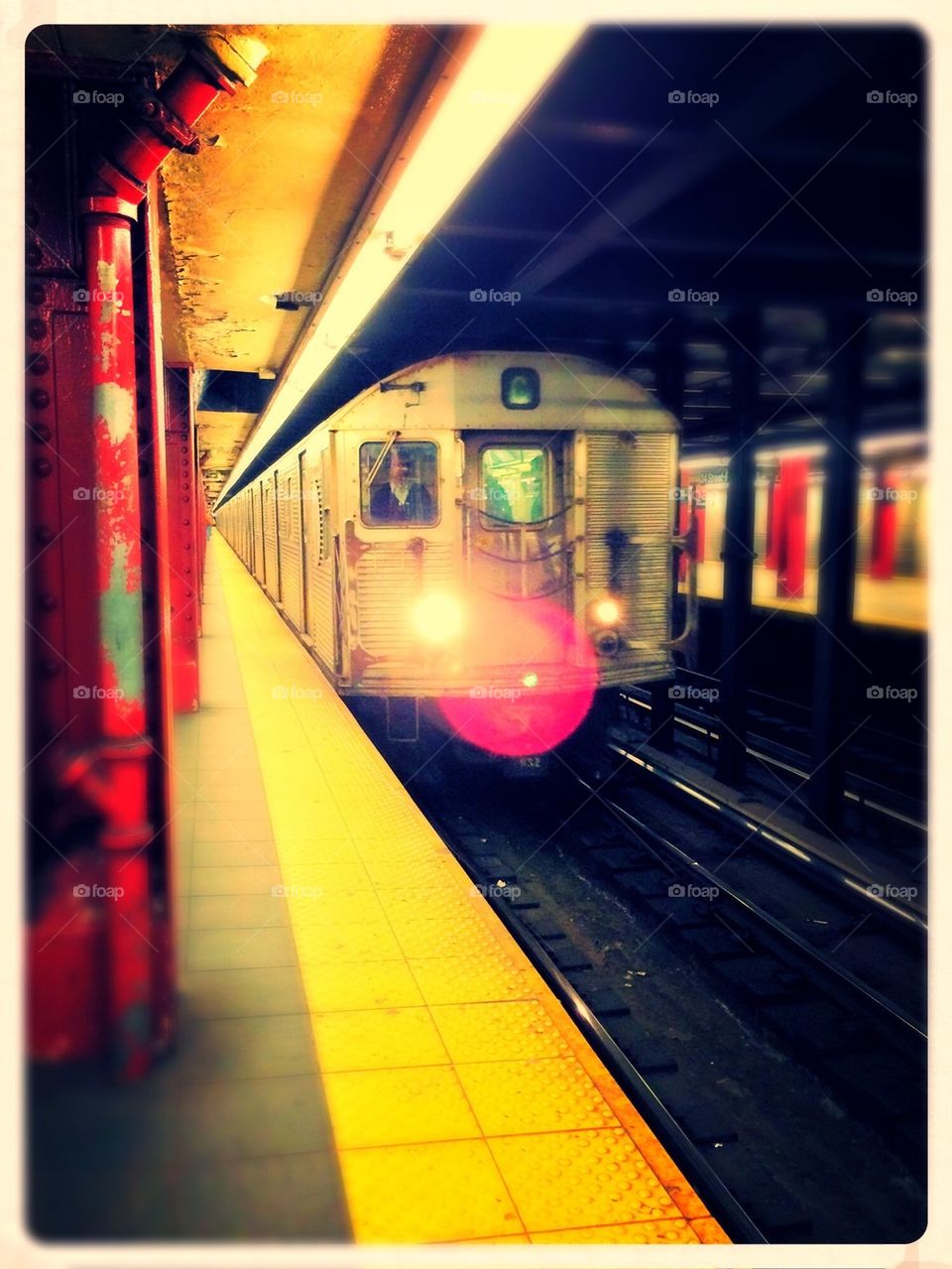 C train pulling into 34th street station