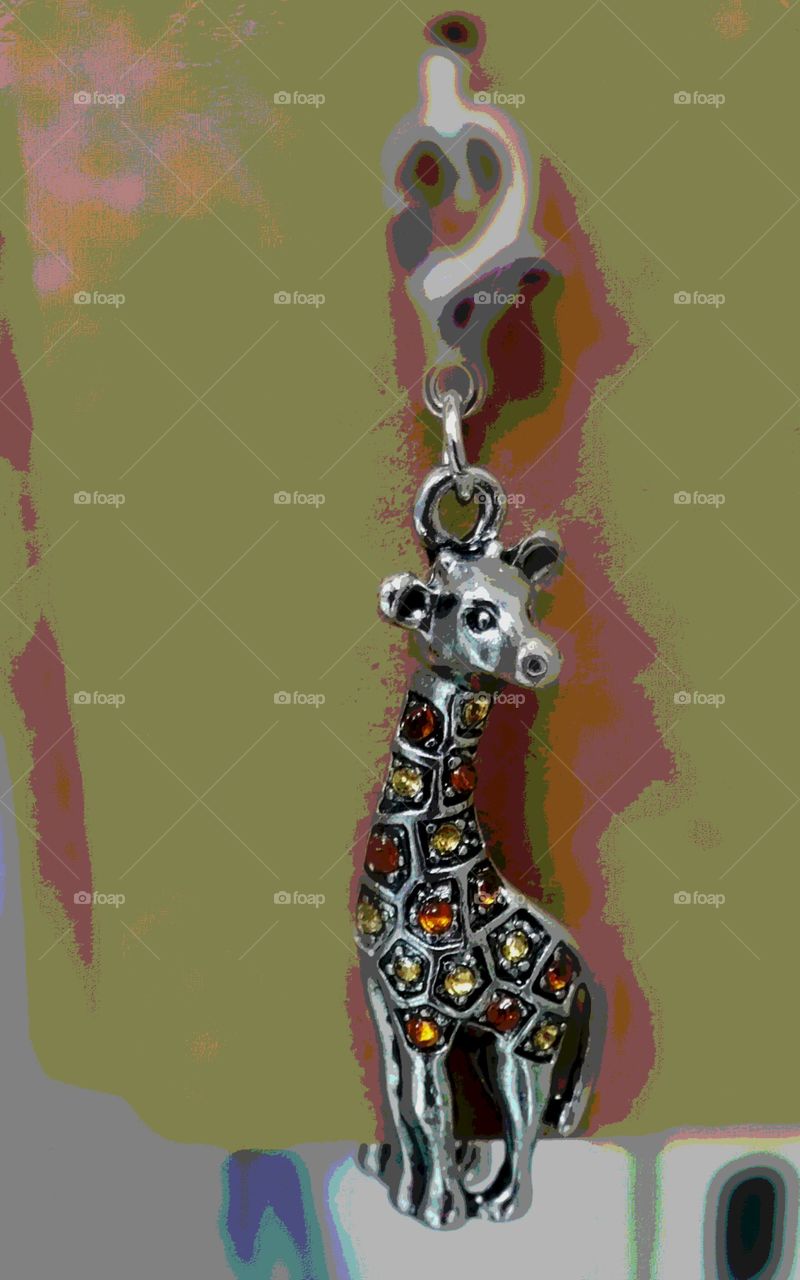 No zoo nearby :) but I make jewelry and this giraffe looked so cute hanging there in the world of giraffe Pendant