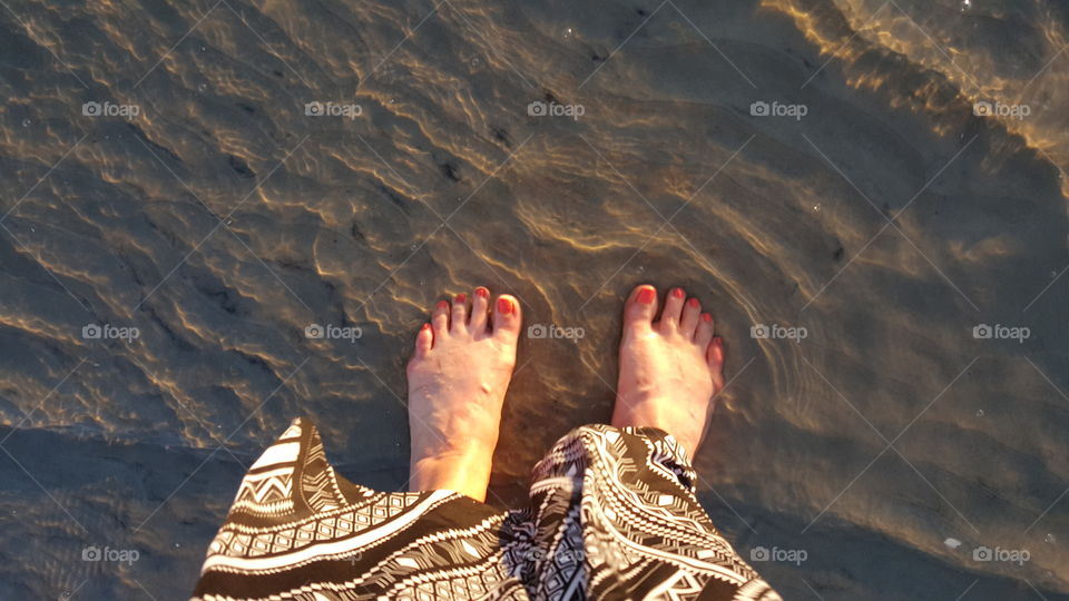 Cooling off my toes in the cool Atlantic waters.