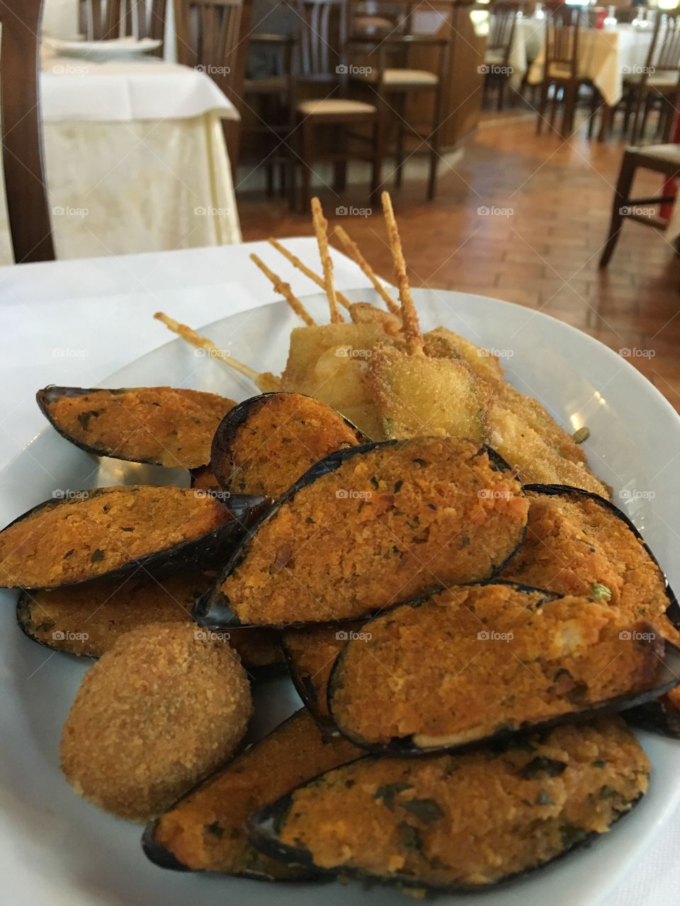 Gratin mussels on the table