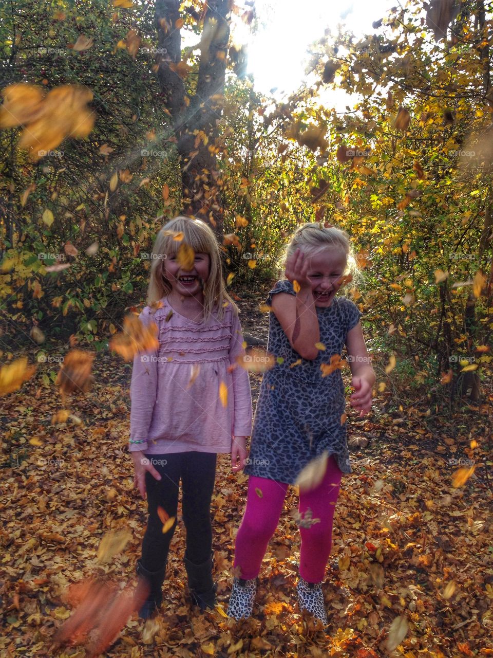 Two girl enjoying in forest